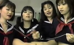 Four Japanese Schoolgirls Playing With A Cock
