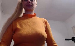 Big tit blonde in a pony tail bounces her boobs up and down