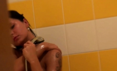 Curvy amateur chick filmed at shower