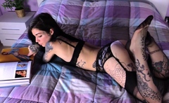 Tattooed sexy in stockings and lingerie